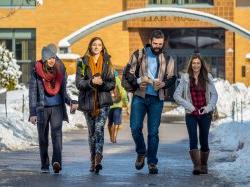 Students walking on campus in snow